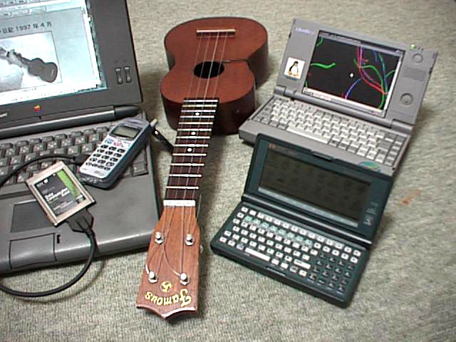 http://www.st.rim.or.jp/~kimu/ukulele/ukulele-and-palmtops-l.jpeg